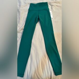 Green Limited Edition Lululemon Wunder Train Leggings.